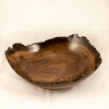 A walnut natural edge bowl by Michael Hollis.